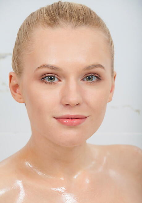 Luscious blonde youthful Xena baring small tits and shaved pussy in shower