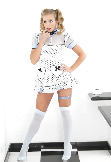 Stunning american blonde cutie Chastity Lynn in sexy skirt exposing her butt and playing with toy 